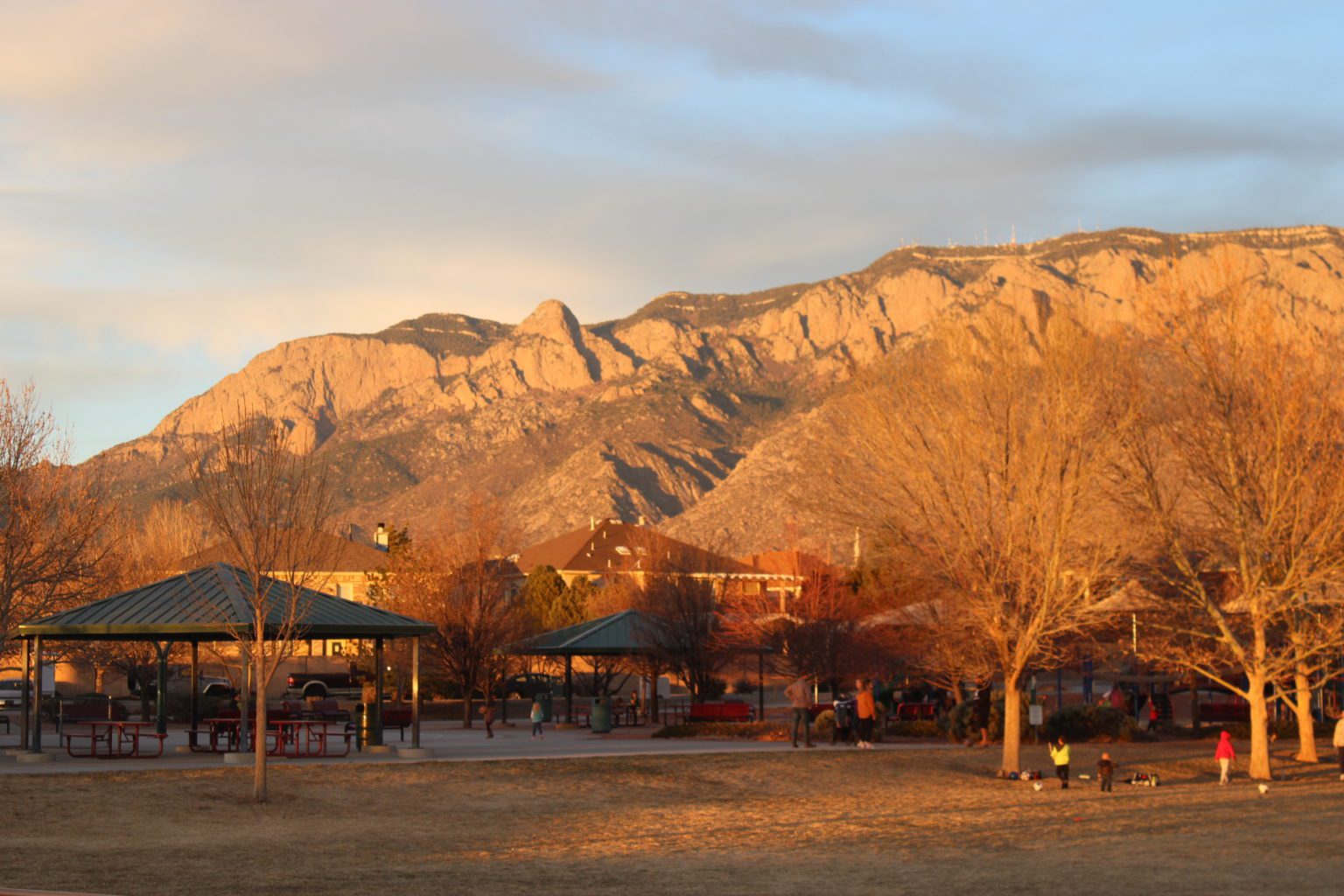 The Sandia Mountains tower over Quintessence Park in northeast Albuquerque.