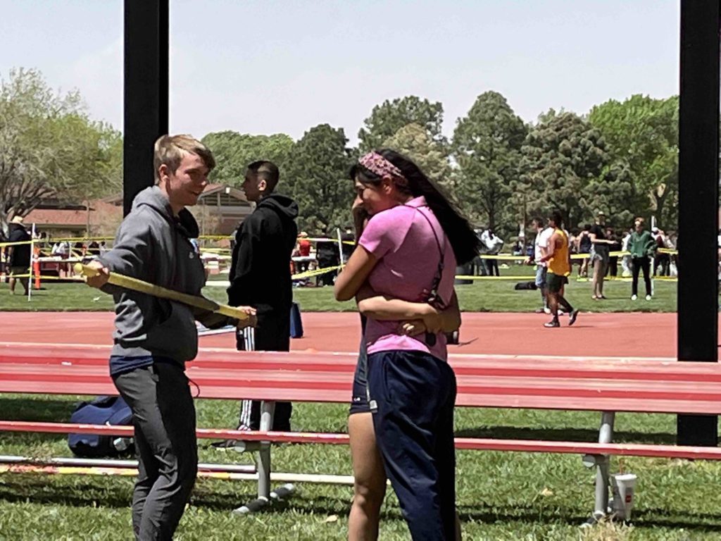 LCHS coach hugging