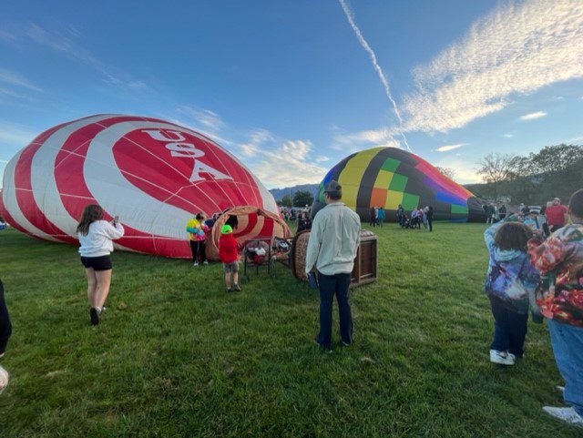 Spirit and Knight Rider inflate just after sunrise at Sombra Del Monte Elementary School was part of Albuquerque Aloft Friday. (Scott Albright/Neighborhood Journal)