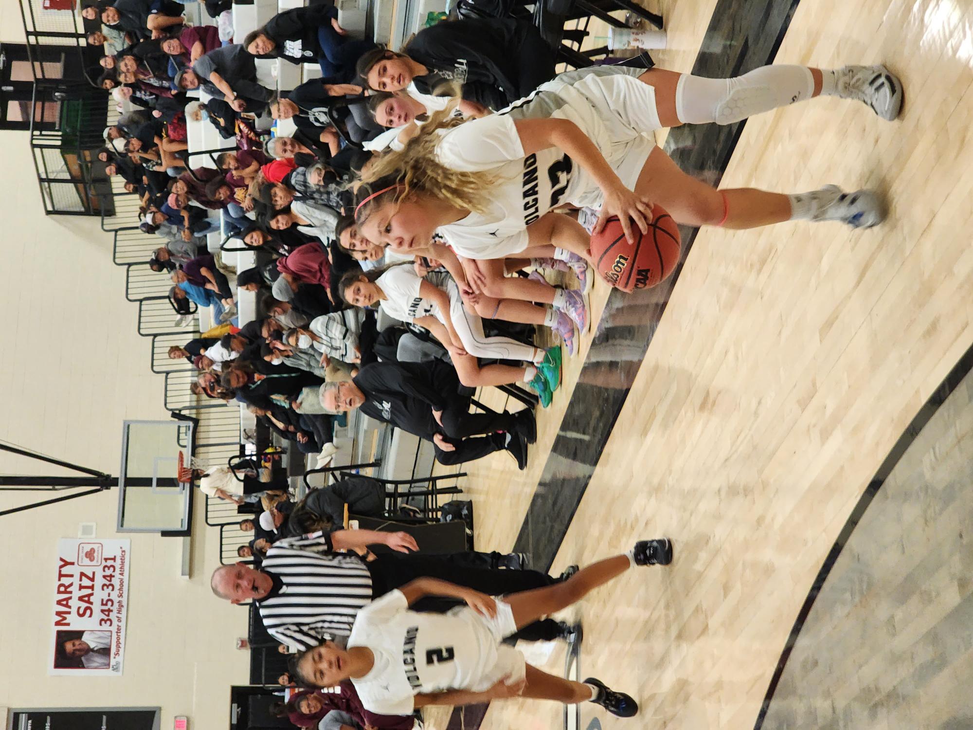 Kevin Hendricks/Neighborhood Journal.
Volcano Vista's Mila Espinoza spots up to shoot a 3 during Tuesday's game.