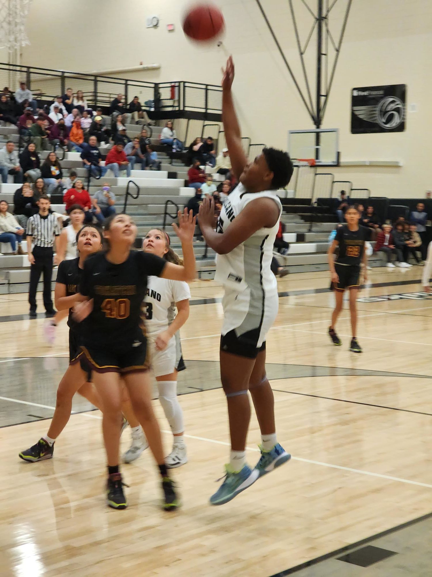 Kevin Hendricks/Neighborhood Journal.
Taejhuan Hill puts up a shot during Volcano Vista's season opener Tuesday night.