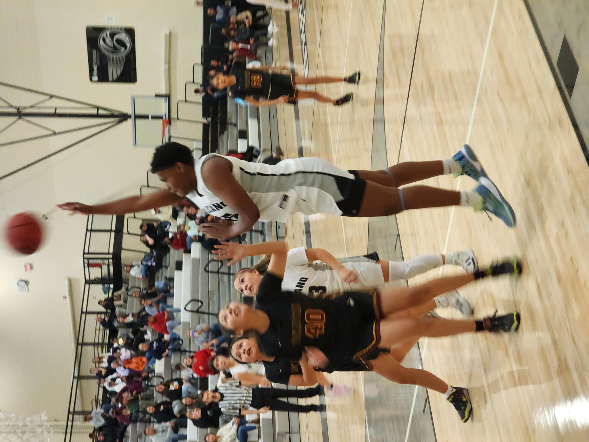 Kevin Hendricks/Neighborhood Journal.
Taejhuan Hill puts up a shot during Volcano Vista's season opener Tuesday night.