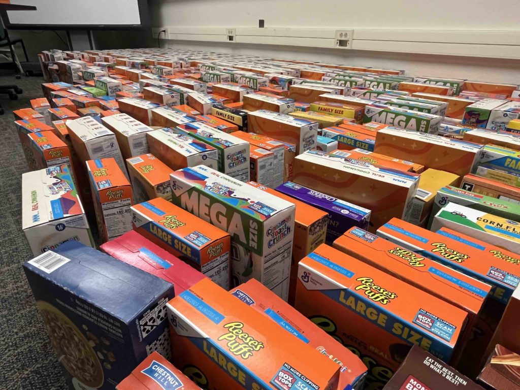 Students at Eisenhower Middle School donate hundreds of cereal boxes to APS McKinney-Vento Program